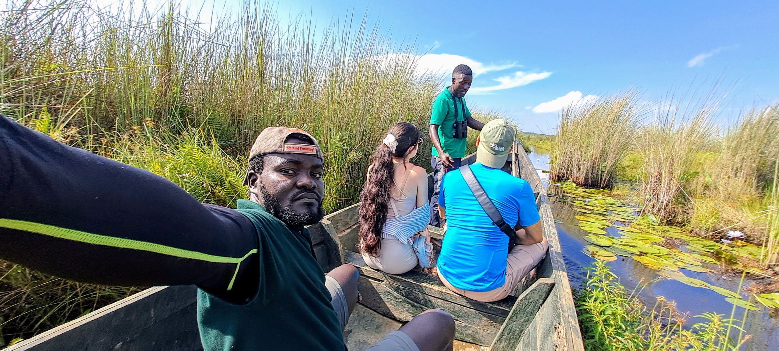 Birdwatcher on a guided Shoebill tour in Mabamba Swamp, Uganda